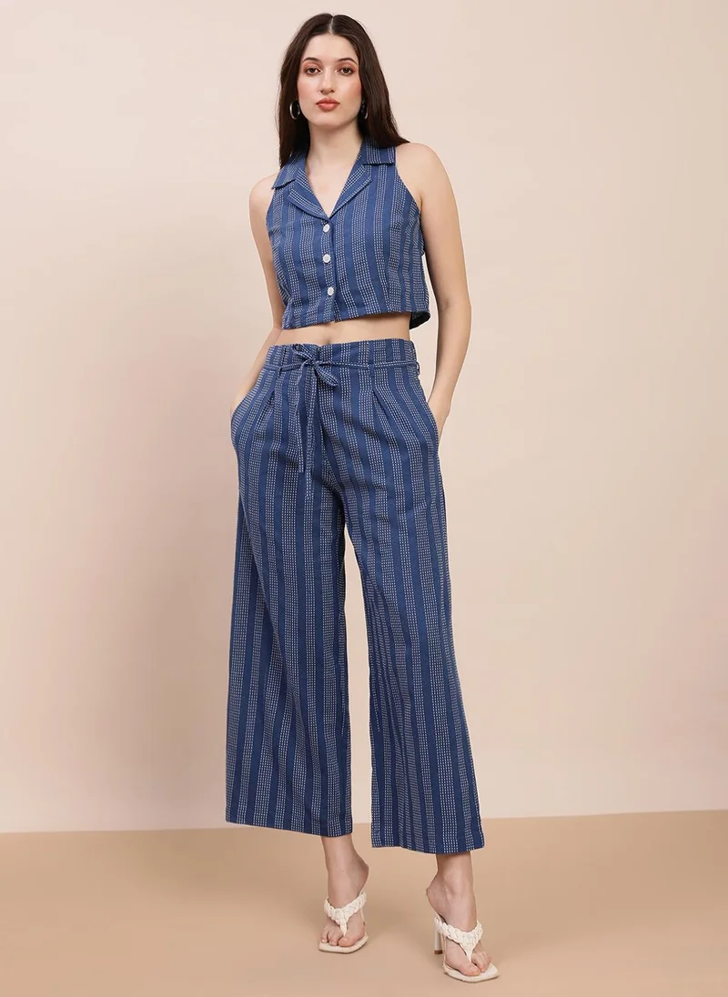 جلو باص طقم نسائي بلوزة قصيرة وبنطلون واسع من جلوبس